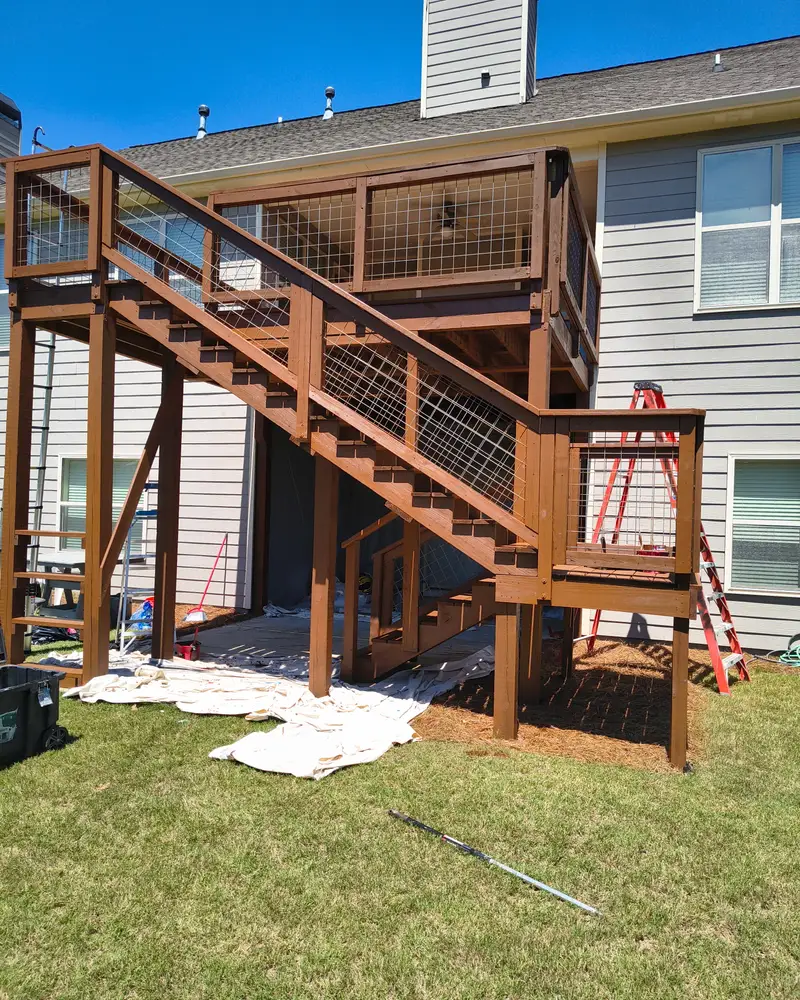 Freshly stained rear deck and stairs, from a Wheeler Painting deck staining project
